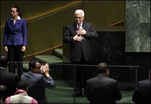 Palestinian President Mahmoud Abbas acknowledges applause after he addressed the United Nations General Assembly.