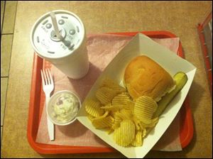 A shredded barbecue sandwich, chips, potato salad, and drink at O'Deer diner cost about $5.