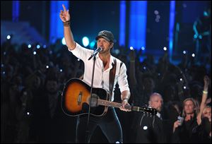 Country musician Luke Bryan will bring his “Dirt Road Diaries” tour to Toledo on Feb. 15. Tickets go on sale Dec. 14 at 10 a.m.