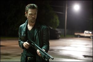 Brad Pitt is a gun for hire in 