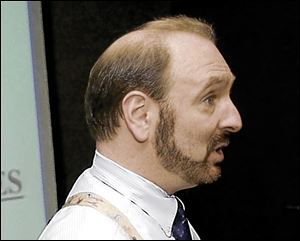 Scott Warrick, an attorney from Reynoldsburg, Ohio, chastised Dr. Reichard while observing and interacting with mammal department employees. 