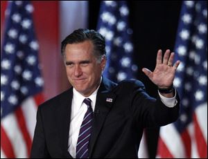 Republican presidential candidate, former Massachusetts Gov. Mitt Romney waving to supporters at an election night rally in Boston. Romneys shadow looms over a GOP in disarray. 