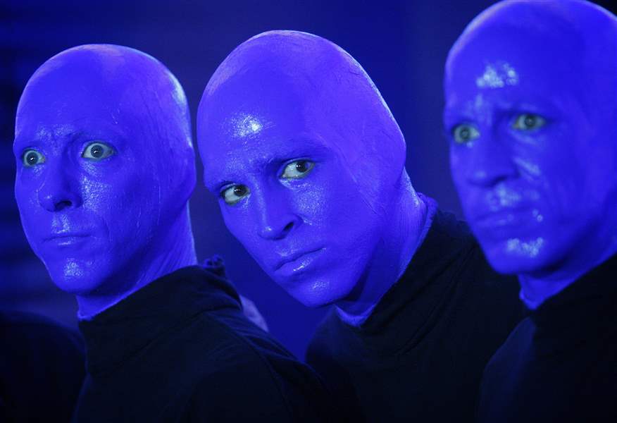 Members-of-the-Blue-Man-Group-promote-their-new-show