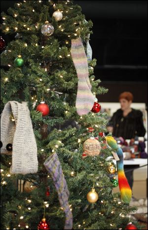 Knitted items on the shop’s Christmas tree will be donated to the Ronald McDonald House. 