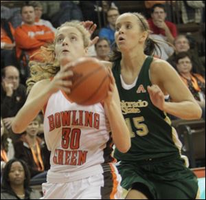 BGSU's Miriam Justinger looks to shoot while defended by Colorado State's Amber Makeever in Saturday's contest at the Stroh Center.