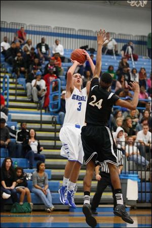 Anthony Wayne's Matt Fox, left, takes a shot against Start's  Richie Lynn. Fox scored 13 points in the season opener for both teams.