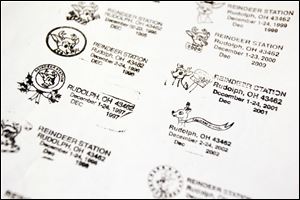 Past cancellation stamps at the Rudolph Post Office. More than 80,000 pieces of mail are expected to be cancelled from Dec. 1-24 in Rudolph, Ohio.
