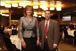 Event chairman Tracey Edwards, left and John Mattimoe, right, during  the Old News Boys Goodfellow Association annual dinner.
