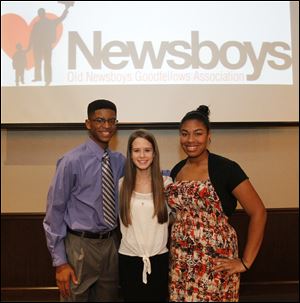 Student scholarship awardees, Brandon Jackson, left, Chantal White, center, Talia Ulrich, right, during  the Old News Boys Goodfellow Association annual dinner.