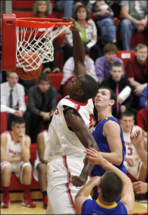 Bowling Green’s Vitto Brown dunks against Findlay on Tuesday. He had 20 points and 15 rebounds.