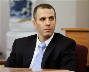 Tony Packo III said little after Tuesday's hearing, only that he was looking forward to a “good holiday.”