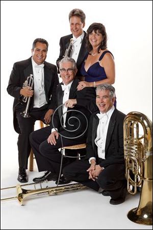 The Tower Brass Quintet. Clockwise from left:: Charles Saenz, Brian Bushong, Bernice Schwartz, David Saygers, and Dan Saygers
