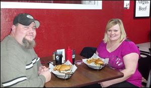 Butch and Angi Lapoint enjoy creative patties at PerrysBurgers in historic downtown Perrysburg.