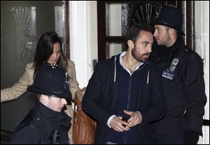 Pippa and James Middleton, siblings of Britain’s Duchess of Cambridge, leave the hospital where the duchess is being treated for acute morning sickness.