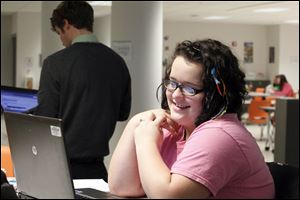 Andrya Ibbitson, 15, of Toledo, works on her computer at Nexus Academy.