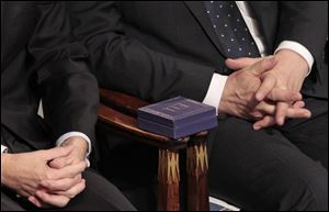 The Nobel Peace Prize medal is seen on in between European Council President Herman Van Rompuy, left, and European Parliament President Martin Schulz, during the Nobel Peace Prize ceremony, at the City Hall in Oslo, Norway, today.