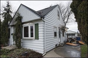 Two men rescued from a Sunday morning fire at 205 Orville Dr. were hospitalized for their injuries, but were expected to survive.