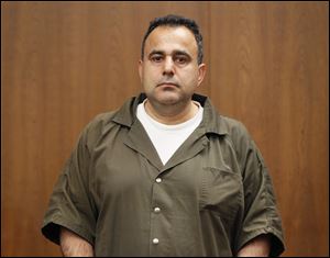 Koray Ergur appears in Toledo Municipal Housing Court, November 30, 2012. Ergur, who owns both the downtown Nicholas and Spitzer buildings, was arrested and placed in jail pending for fire department order violations.