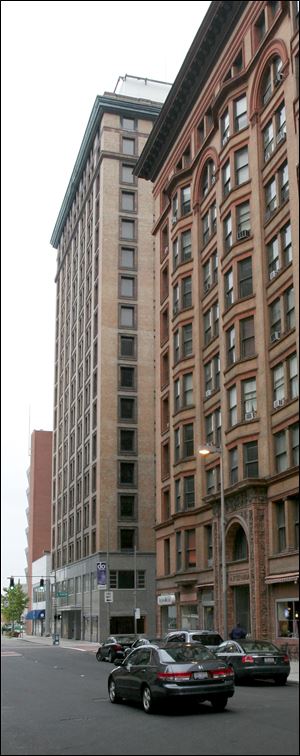 The Nicholas Building on left, Spitzer Building on right.