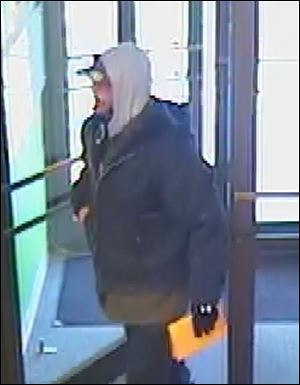 The suspect is described as a white male, between the ages of 40 to 50, approximately 5’ 11” to  6 feet tall, medium build, weighing between 170 and 180 pounds, and with facial hair.