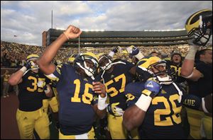 The Michigan coaching staff has moved freshman Dennis Norfleet, No. 26, from tailback to cornerback for the Outback Bowl.