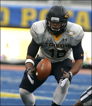 Toledo's Chuck Jacobs misses a pass against Utah State.