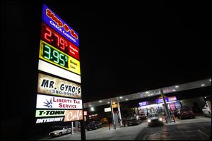 The Stop & Go on Airport Highway in Toledo is one of many area stations that cut gasoline prices far below $3 a gallon Sunday.