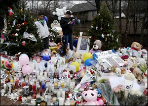 One of several makeshift memorials in the Sandy Hook Village of Newtown, Conn., as the town mourns victims killed in a school shooting.