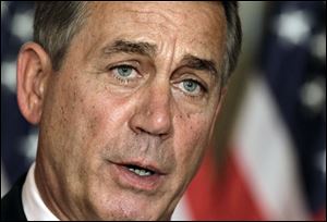 House Speaker John Boehner, R-Ohio, speaks at a news conference on Capitol Hill in Washington.  President Obama and Speaker Boehner met at the White House today in search of a compromise to avert the economy-threatening 