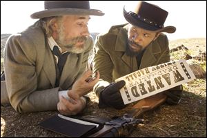 Christoph Waltz as Schultz, left, and Jamie Foxx as Django in the film, 