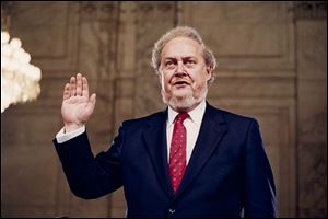 Judge Robert Bork, nominated by President Reagan to be an associate justice of the Supreme Court, is sworn before the Senate Judiciary Committee on Capitol Hill at his confirmation hearing, September, 1987.