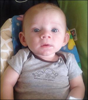Toledo Police said Avery Glynn Bacon, 6 months old, died Tuesday night about 11 p.m.