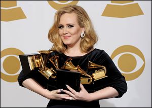 Singer Adele, at the 54th Annual Grammy Awards in February, won six awards, including album of the year. Her live performance that night marked her return from vocal surgery.