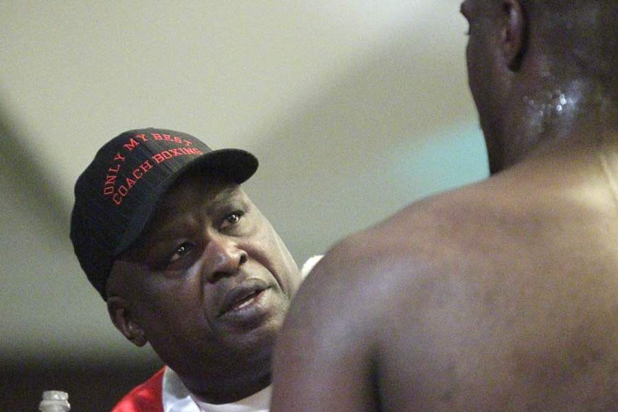 James-Buster-Douglas-speaks-with-his-fighter