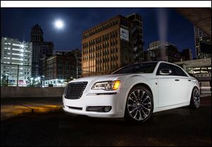 In the new ad, Detroit native Berry Gordy, who founded Motown Records, is driven through Detroit in a 2013 Chrysler 300 Motown Edition that ends up in front of a theater in Manhattan.