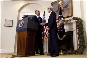 President Barack Obama shakes hands with Sen. John Kerry, D-Mass., his choice to be the next Secretary of State,  as he makes his announcement in the Roosevelt Room of the White House in Washington.