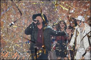 Season two winner Tate Stevens performs during THE X FACTOR Finale on Thursday night.