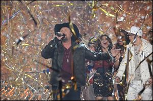 Season two winner Tate Stevens performs during THE X FACTOR Finale on Thursday night.