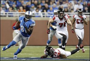 Detroit Lions wide receiver Calvin Johnson broke Jerry Rice's single-season yards receiving record of 1,848 in Saturday night's 31-18 loss to Atlanta.