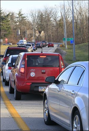 During peak times, traffic exiting eastbound I-475 at Corey Road backs up onto the freeway.