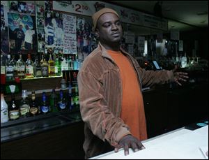 Suron Jacobs in his Central Avenue bar, Big Shots.
