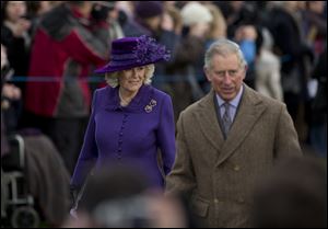 Britain's Prince Charles and his wife Camilla the Duchess of Cornwall arrive for the British royal family's traditional Christmas Day church service in Sandringham, England.