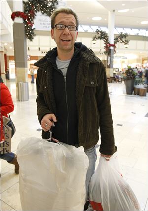 Ryan Osier, who was exchanging coats, found Wednesday's lighter crowd more laid back than the pre-Christmas shoppers.