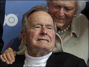 Former President George H.W. Bush and his wife, Barbara, arrive for the premiere of HBO's new documentary about his life in Kennebunkport, Maine.