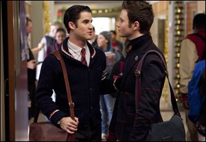 Darren Criss, left, and Chris Colfer, are shown in a scene from 