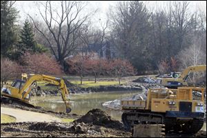 The Toledo Botanical Garden is dredging Crosby Lakes, the two artificial lakes in the garden, as part of the restoration project.