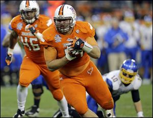 Defensive tackle Chris Jones runs with a fumble recovery which set up a BG touchdown.