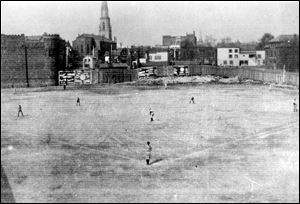 St. Mary's Roman Catholic Church stood in the background of the Armory Park baseball field, where the Notre Dame-University of Michigan game was played 110 years ago. 