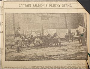 The two teams, in leather helmets and quilt-padded uniforms, face off on Oct. 18, 1902, in the mud at Spielbusch Avenue and Orange Street, now the site of the federal courthouse in downtown Toledo.