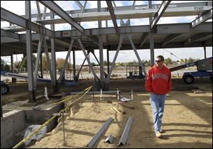 project superintendent David Wagner of Wallace & Smith walks through the skeleton of a 28,000-square-foot business complex that will open in April in in Bakersfield, Calif. Wagner said much of the space already is spoken for.